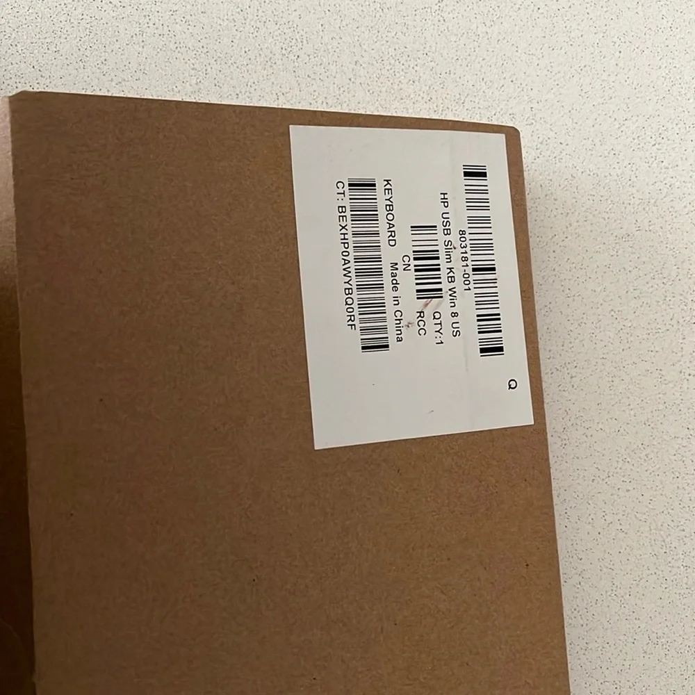 A never been used HP slim KB Win 8 US
